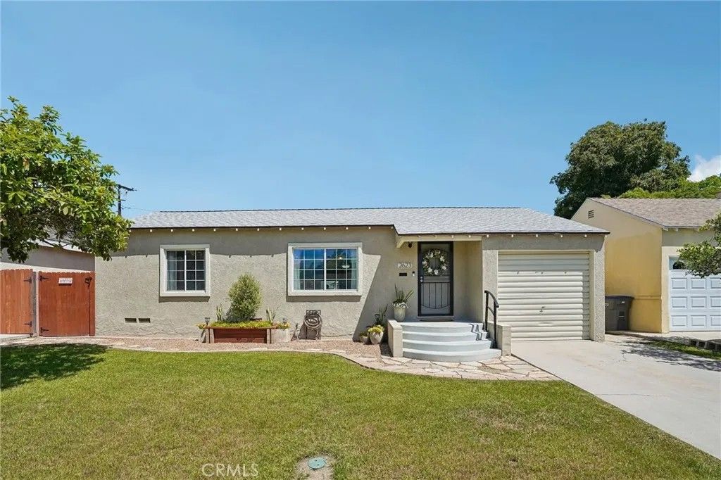 Photo of 2623 E 219th Street, Long Beach, CA 90810 (MLS # PW26088487)