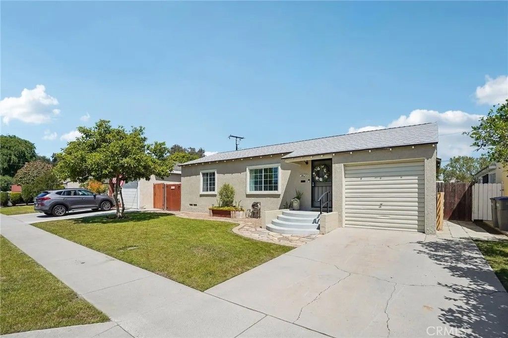 Photo of 2623 E 219th Street, Long Beach, CA 90810 (MLS # PW26088487)
