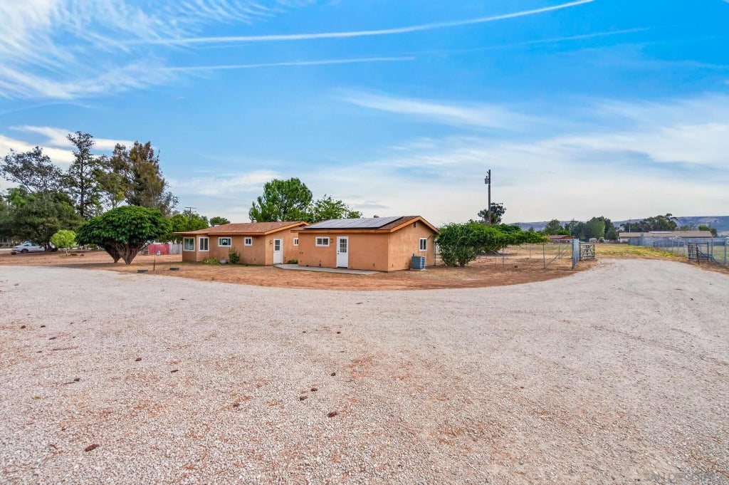 Photo of 1448 San Vicente Rd, Ramona, CA 92065 (MLS # 260021026)