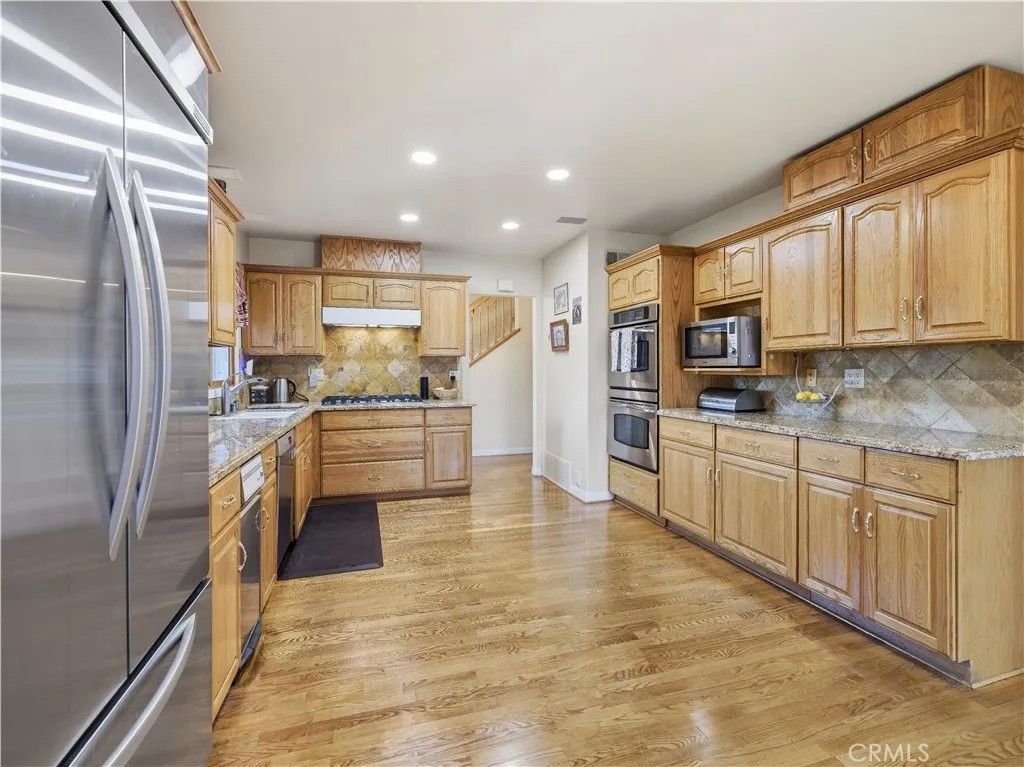 Photo of 11614 Ostrom Ave, Granada Hills, CA 91344 (MLS # SR26067975)