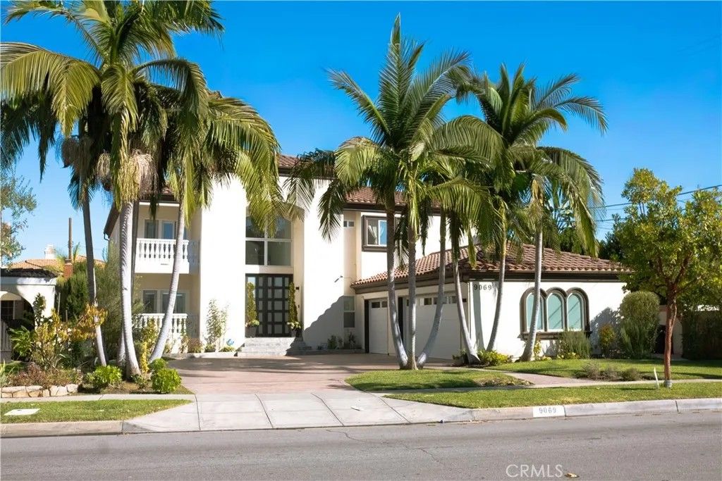 Photo of 9069 Gallatin Rd, Downey, CA 90240 (MLS # DW25266951)