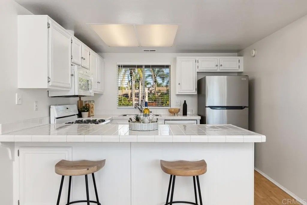 Photo of 1330 Palomar Place #7, Vista, CA 92084 (MLS # NDP2601928)