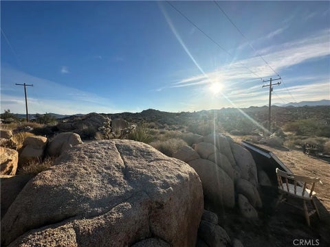 Photo of 57672 Shepherd Lane, Yucca Valley, CA 92284 (MLS # JT26200770)