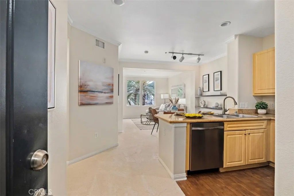 Photo of 3458 Watermarke Pl, Irvine, CA 92612 (MLS # OC26024216)