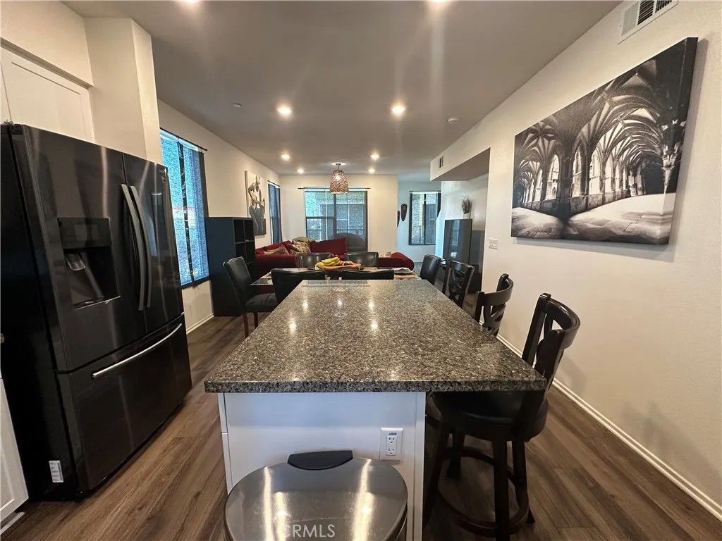 Photo of 17612 Garden House Lane, Bellflower, CA 90706 (MLS # OC26024484)