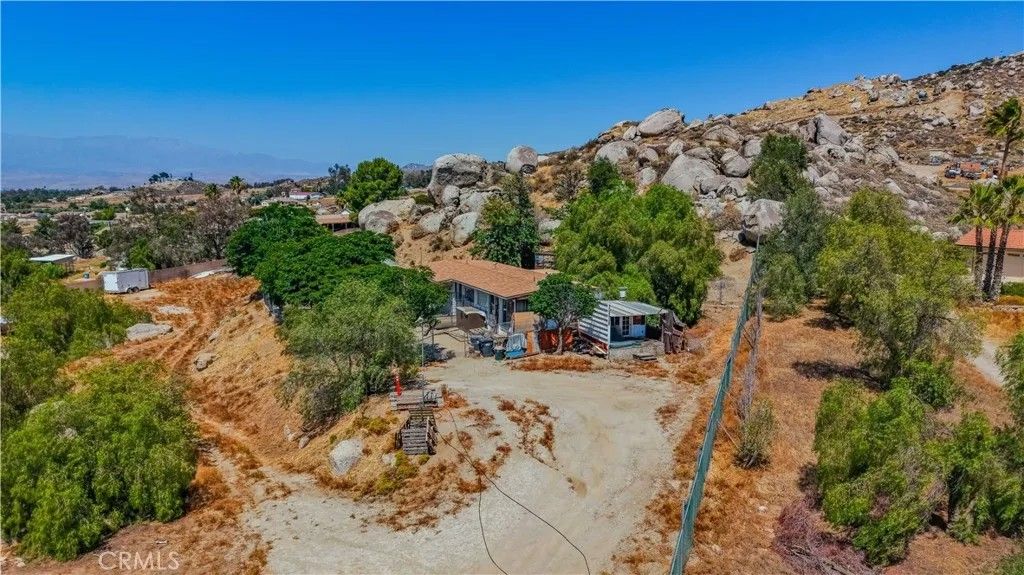 Photo of 22740 Ramona AVE, Nuevo, CA 92567 (MLS # SW26119547)