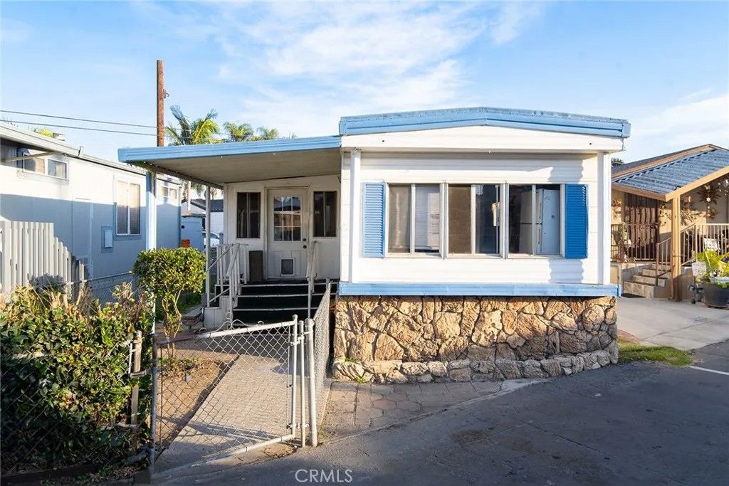 Photo of 8811 Park St #115, Bellflower, CA 90706 (MLS # DW26003195)