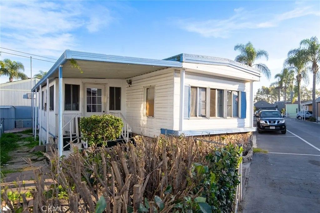 Photo of 8811 Park St #115, Bellflower, CA 90706 (MLS # DW26003195)