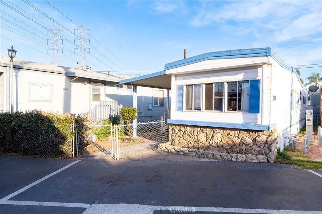 Photo of 8811 Park St #115, Bellflower, CA 90706 (MLS # DW26003195)