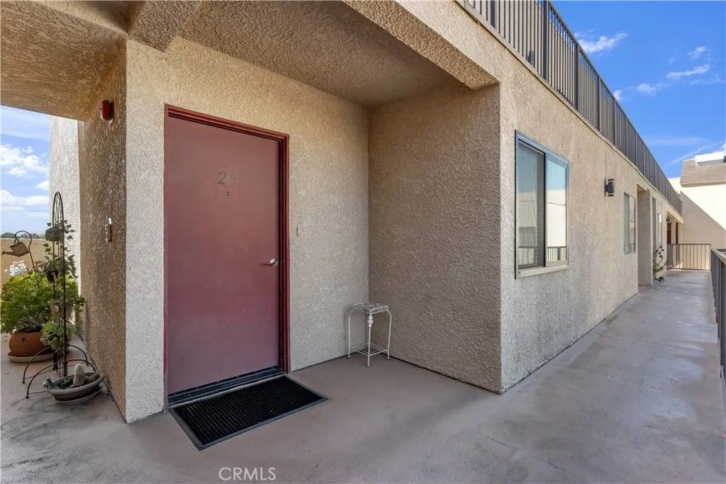 Photo of 21040 Parthenia St #25, Canoga Park, CA 91304 (MLS # SR26054594)
