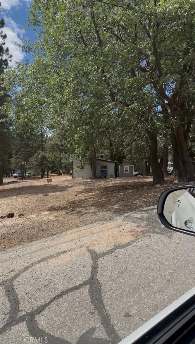 Photo of 33415 Wild Rose Dr, Green Valley Lake, CA 92341 (MLS # SB26227078)
