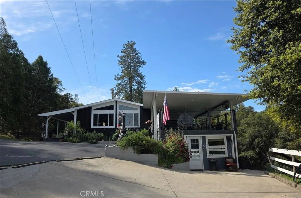 Photo of 50639 Critter Creek Lane, Oakhurst, CA 93644 (MLS # OC26095883)