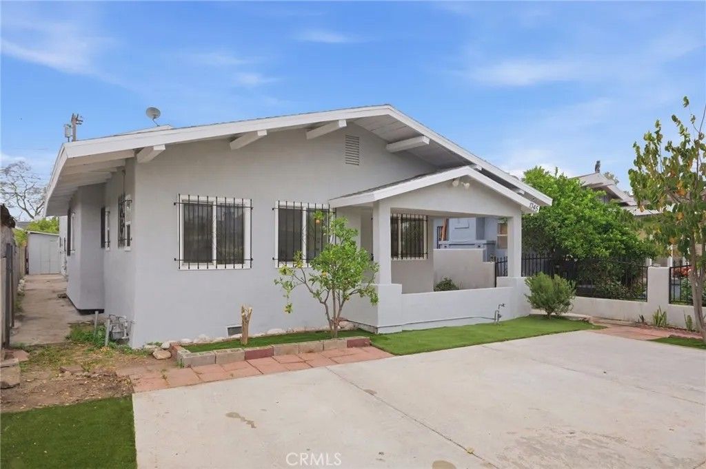 Photo of 1345 W 51st Place, Los Angeles, CA 90037 (MLS # SB26065658)