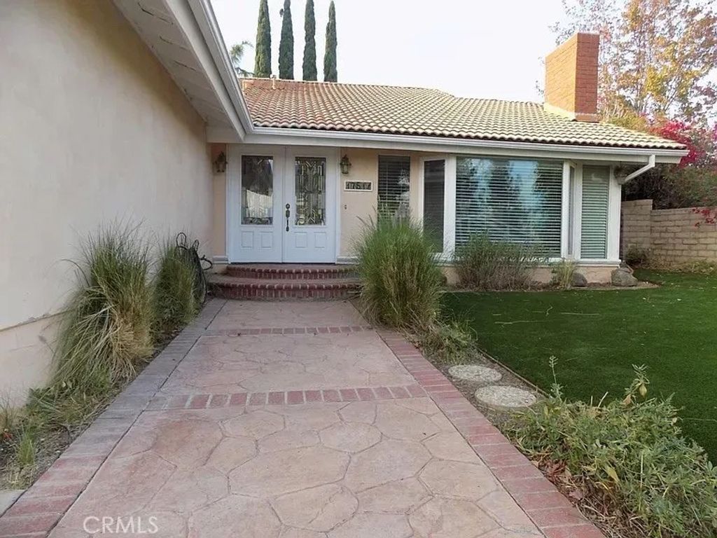 Photo of 17511 Tuscan Dr, Granada Hills, CA 91344 (MLS # GD26022680)