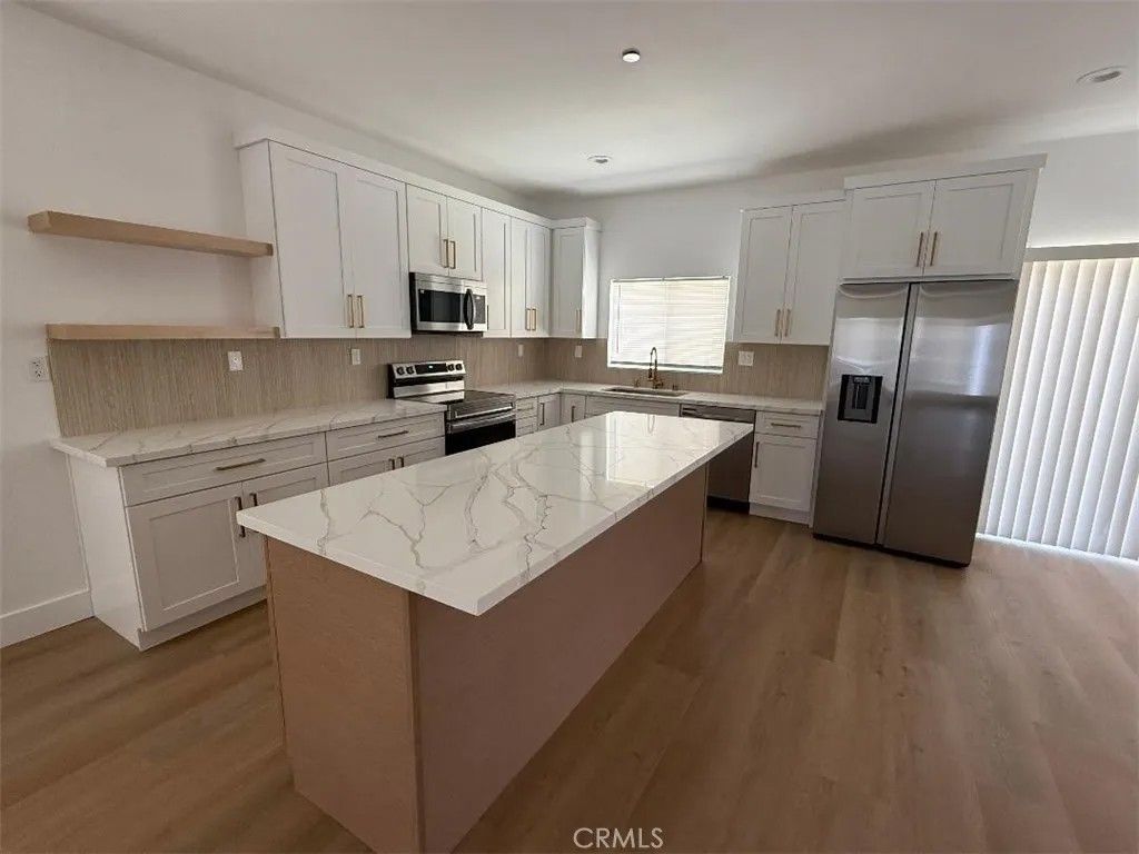 Photo of 617 Acacia Street, Lake Elsinore, CA 92530 (MLS # OC25172039)