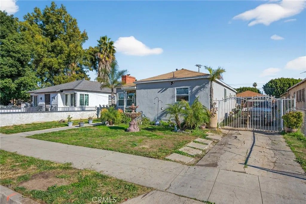 Photo of 14822 S Butler Ave, Compton, CA 90221 (MLS # OC25278153)