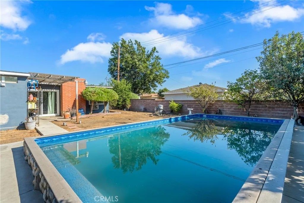 Photo of 1333 Singingwood Ave, Pomona, CA 91767 (MLS # MB26076854)