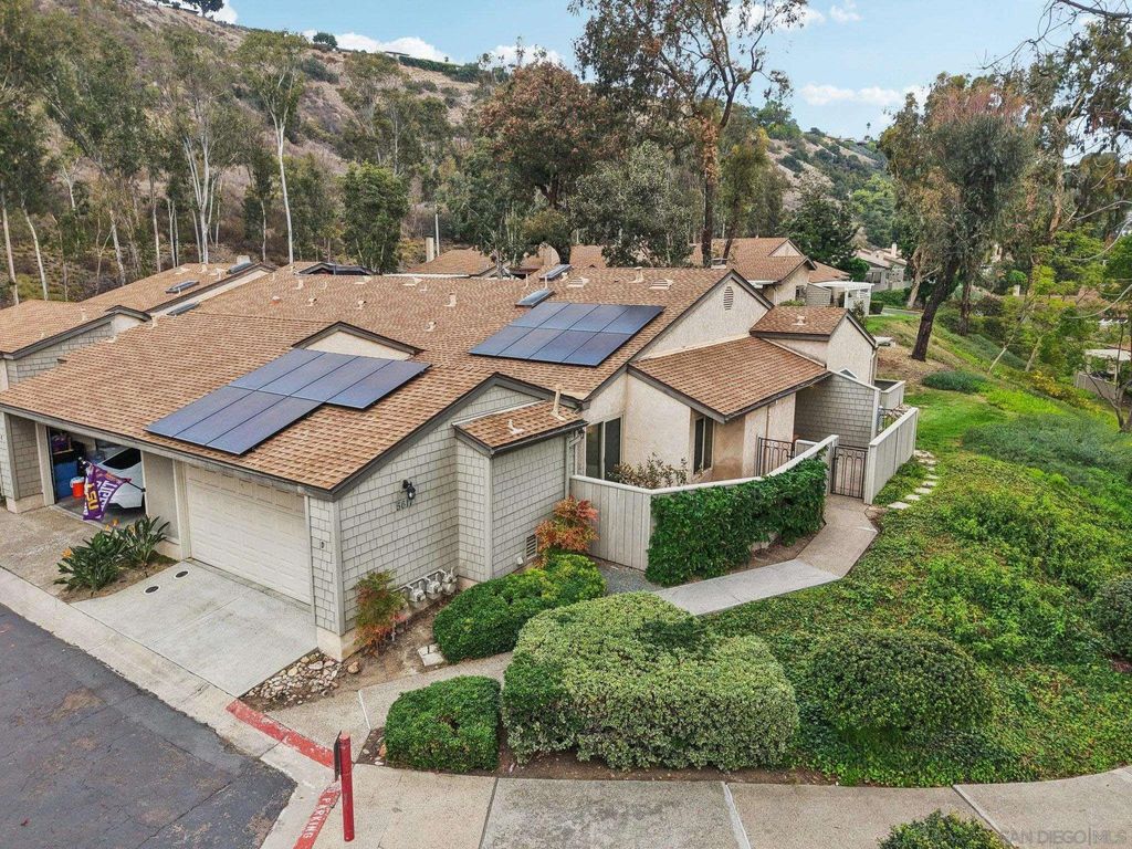 Photo of 5617 Adobe Falls Rd #D, San Diego, CA 92120 (MLS # 250044005)