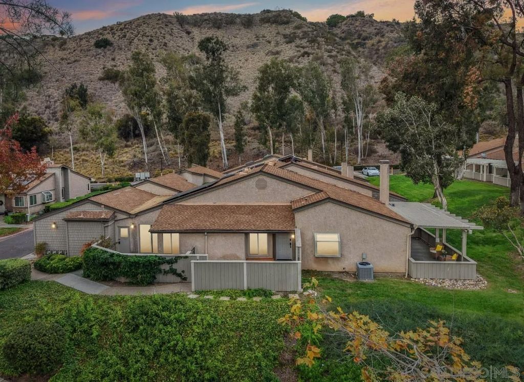 Photo of 5617 Adobe Falls Rd #D, San Diego, CA 92120 (MLS # 250044005)