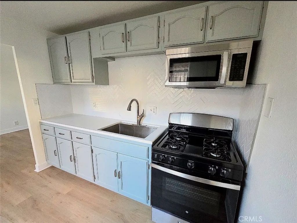 Photo of 1306 W 83rd Pl, Los Angeles, CA 90044 (MLS # DW26078321)