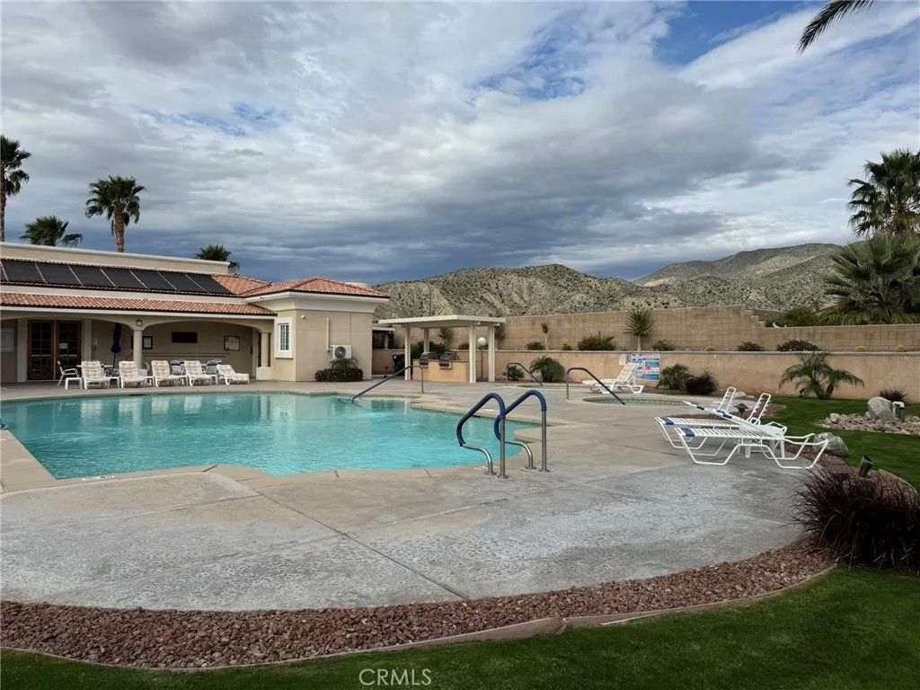 Photo of 65057 Cliff Cir, Desert Hot Springs, CA 92240 (MLS # PW26000118)