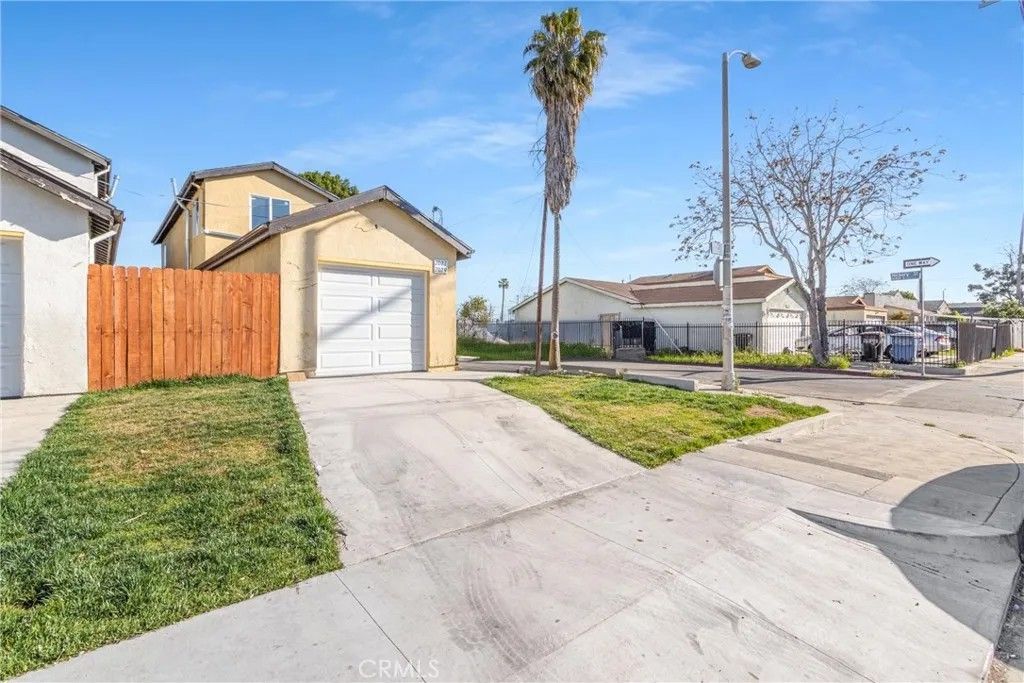 Photo of 2027 E 105th, Los Angeles, CA 90002 (MLS # MB26066383)