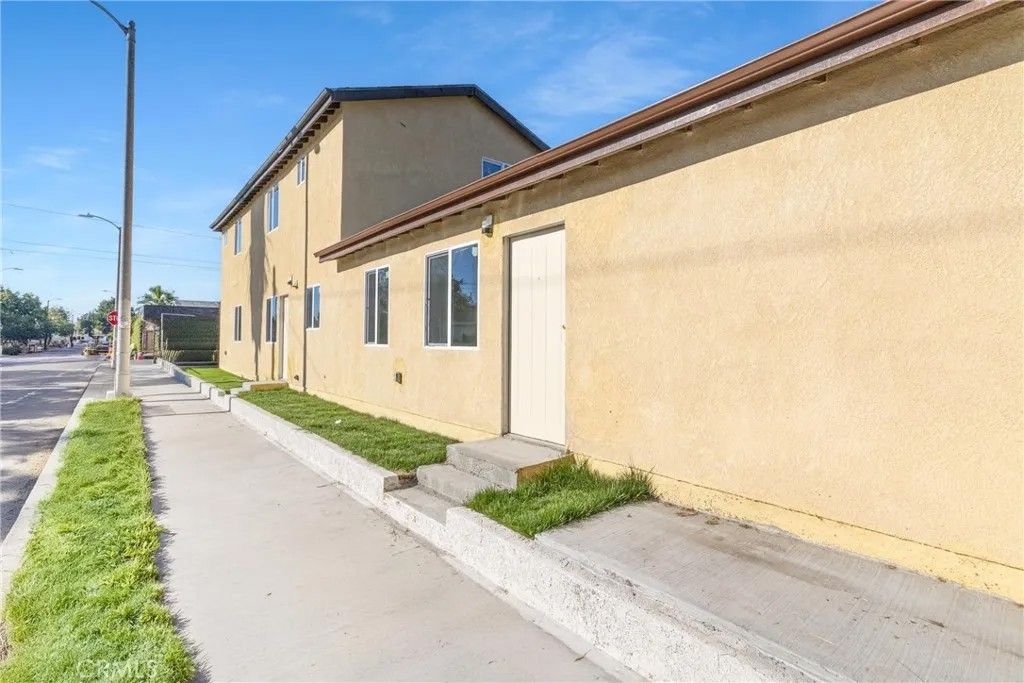 Photo of 2027 E 105th, Los Angeles, CA 90002 (MLS # MB26066383)