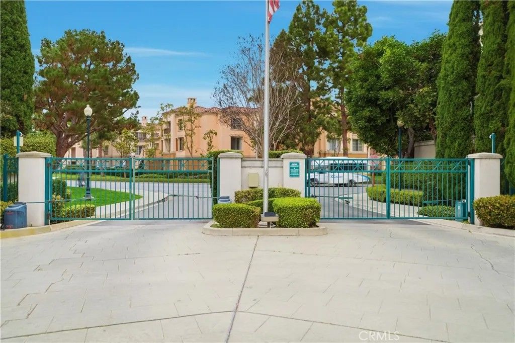 Photo of 8 Cuzzano Aisle, Irvine, CA 92606 (MLS # OC26030073)