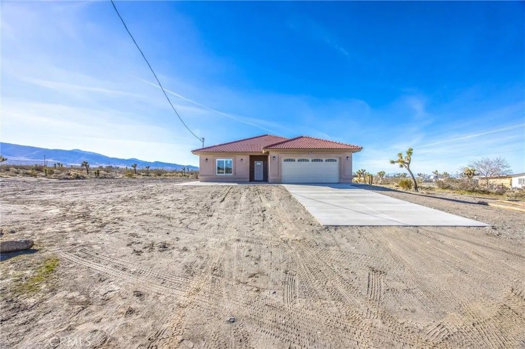 Photo of 11788 Buckwheat Rd, Pinon Hills, CA 92371 (MLS # HD25280740)