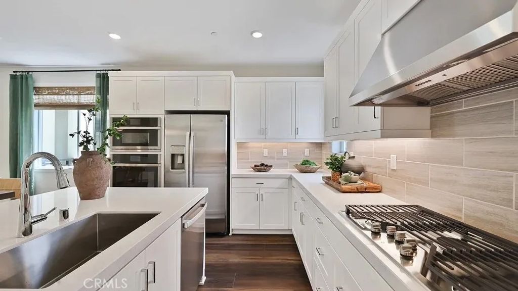 Photo of 27461 N Limber Pine Place, Valencia, CA 91381 (MLS # OC26009714)