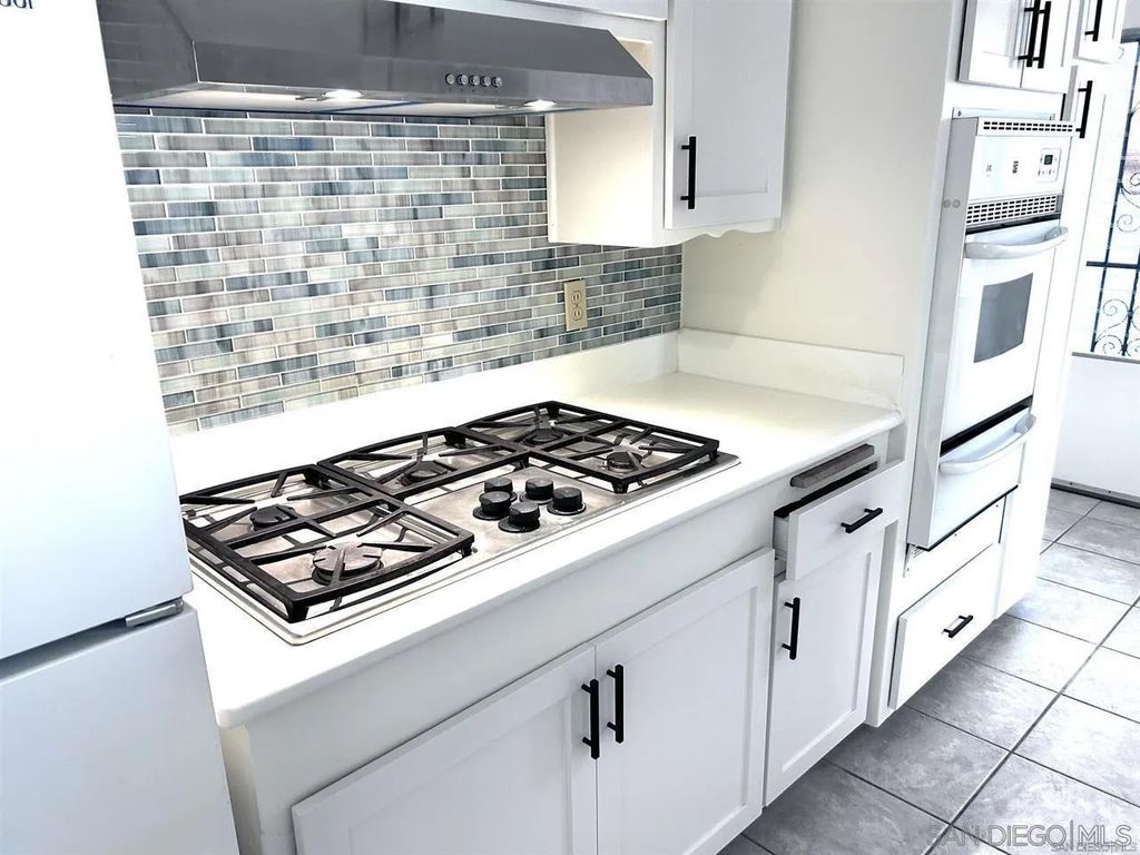 Photo of 6458 Mount Aguilar Dr, San Diego, CA 92111 (MLS # 250045535)