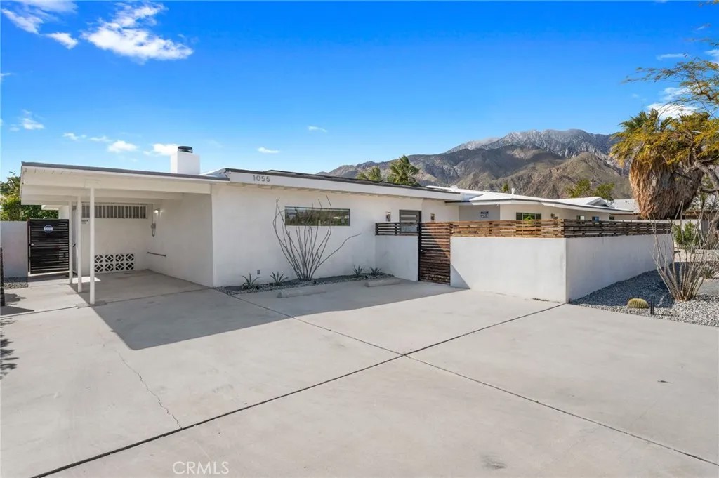 1055 E Racquet Club