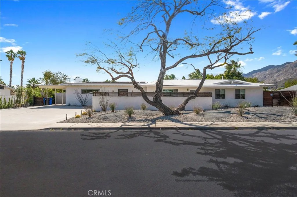 1055 E Racquet Club