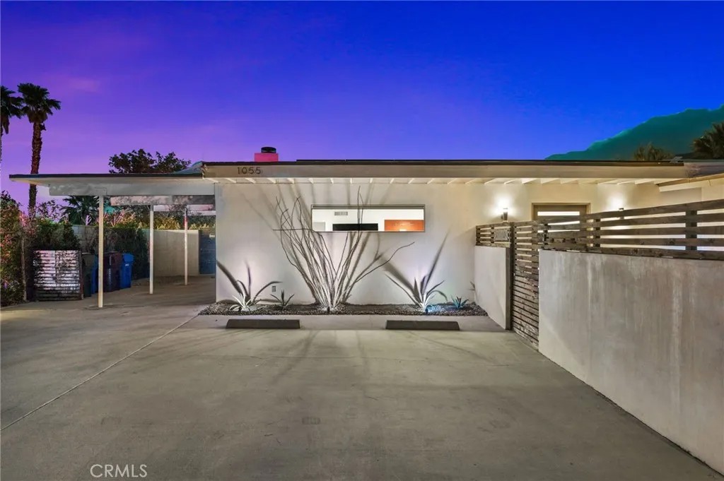 1055 E Racquet Club