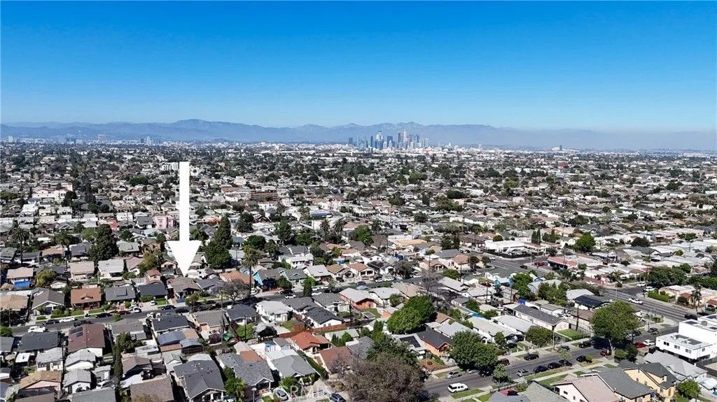 Photo of 1453 W 56th St, Los Angeles, CA 90062 (MLS # CV26063670)