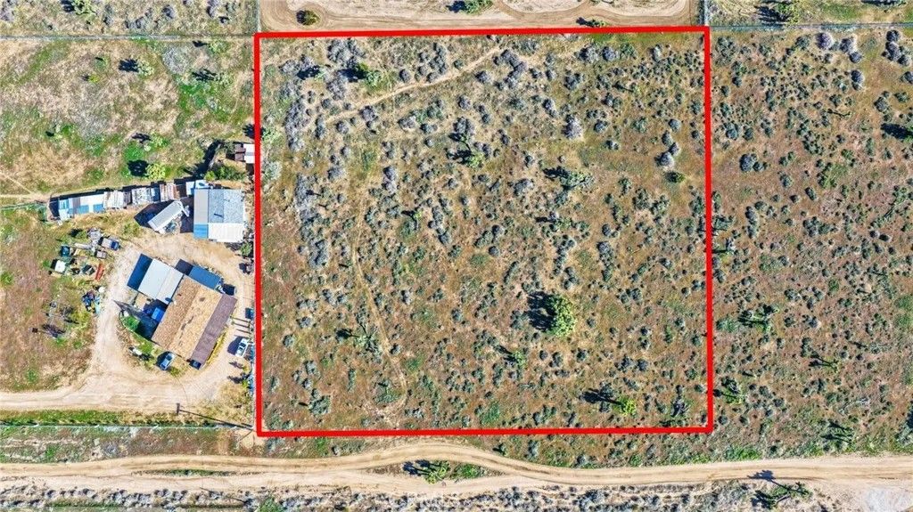 Photo of 10435 Manada Rd, Phelan, CA 92371 (MLS # CV26013493)