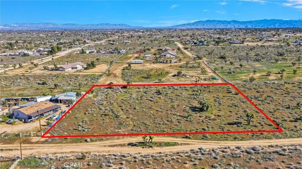 Photo of 10435 Manada Rd, Phelan, CA 92371 (MLS # CV26013493)