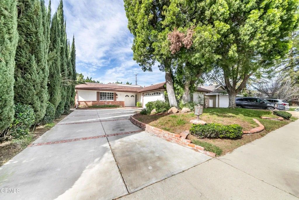 Photo of 10037 Sunnybrae Avenue, Los Angeles, CA 91311 (MLS # P1-25919)