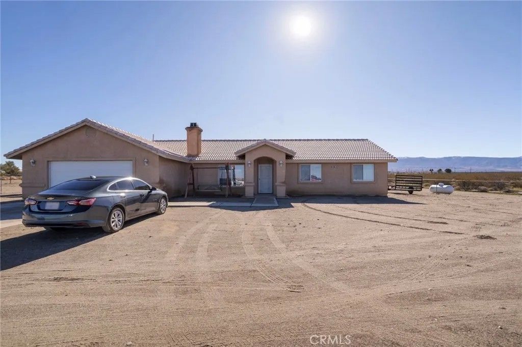 Photo of 4265 Camellia Rd, Phelan, CA 92371 (MLS # HD25280857)