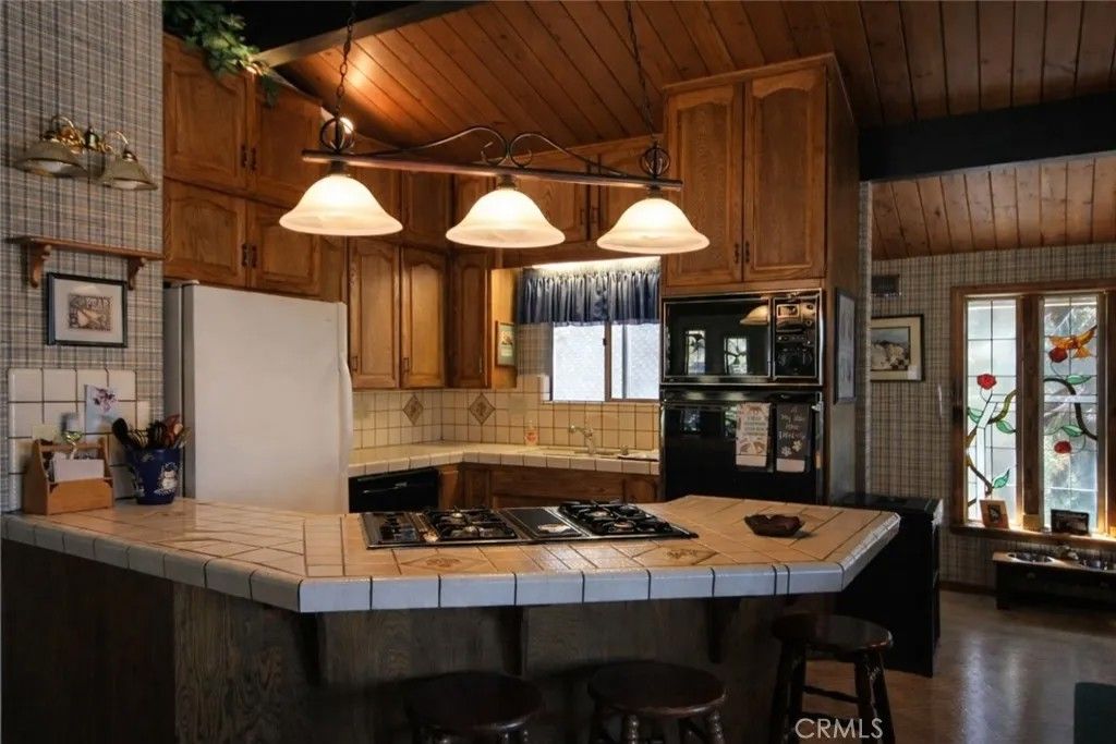 Photo of 1962 Nob Hill, Running Springs, CA 92382 (MLS # IG26083677)