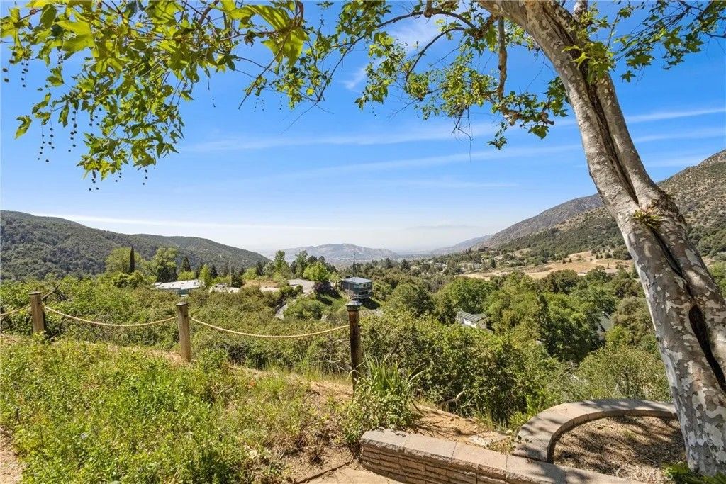 Photo of 38736 Oak Glen Road, Oak Glen, CA 92399 (MLS # IG26079373)