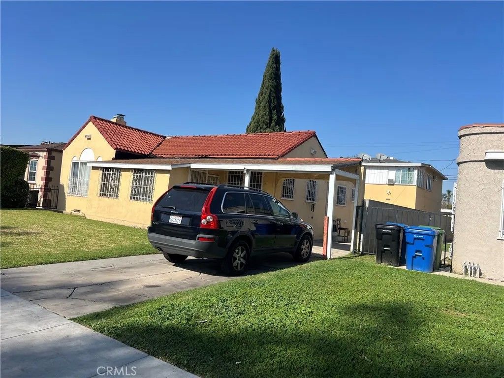 Photo of 1605 W 87th St, Los Angeles, CA 90047 (MLS # DW26024680)