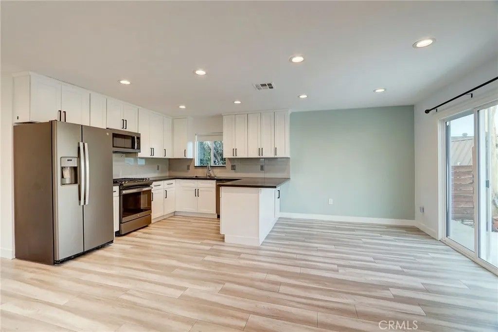 Photo of 7441 Beckford Avenue, Reseda, CA 91335 (MLS # SR26097775)