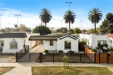 Photo of 1626 W 60th Place, Los Angeles, CA 90047 (MLS # DW25245905)