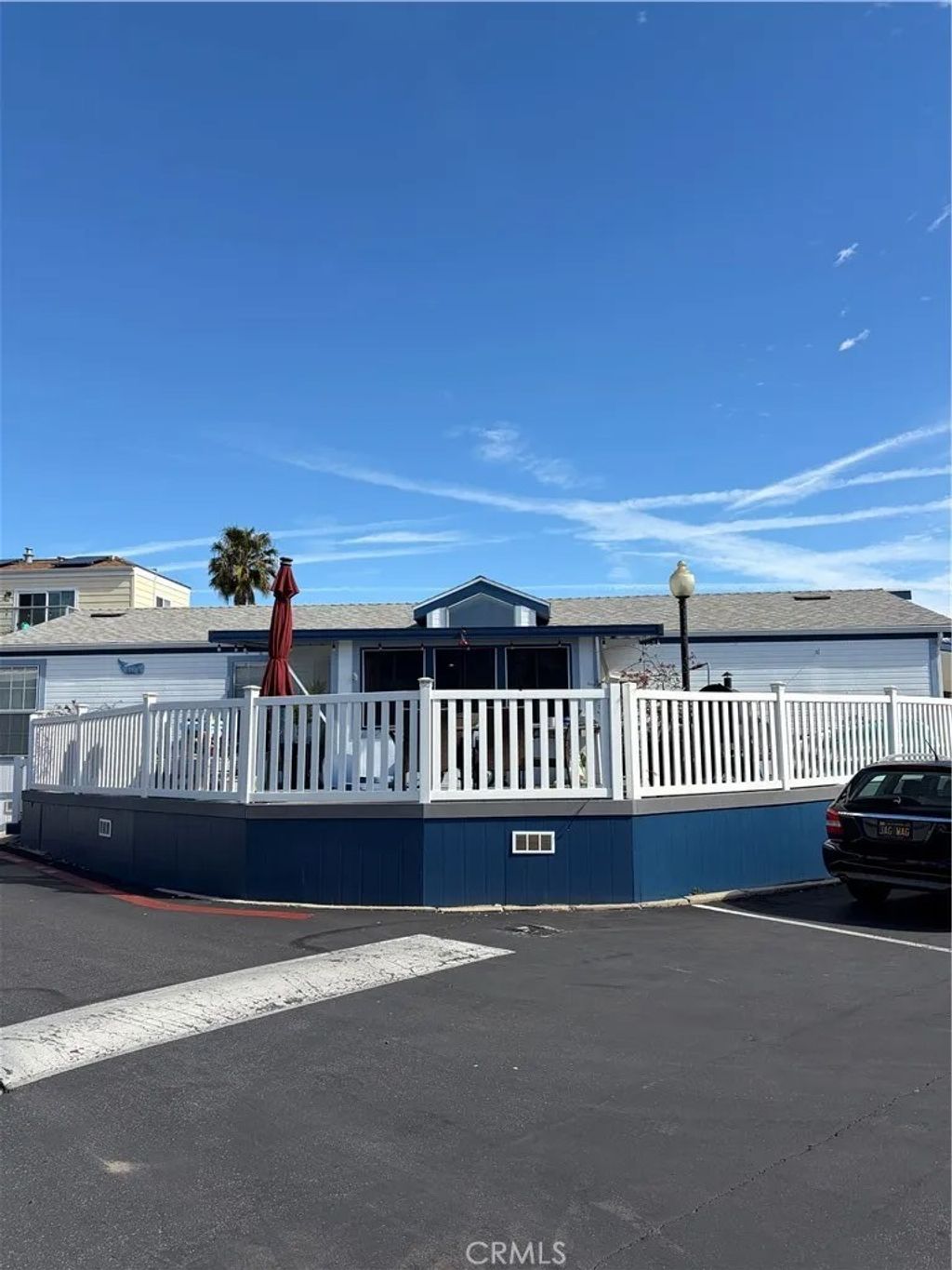 Photo of 80 Huntington St #218, Huntington Beach, CA 92648 (MLS # OC26044469)