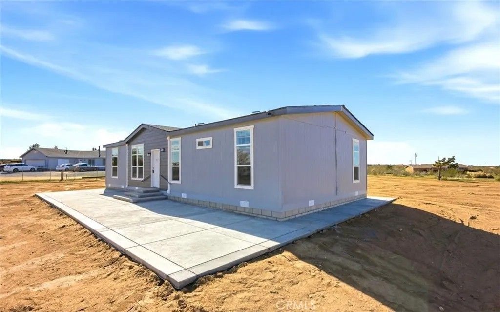 Photo of 12594 Atsina Road, Phelan, CA 92371 (MLS # TR26022181)