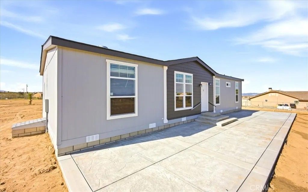 Photo of 12594 Atsina Road, Phelan, CA 92371 (MLS # TR26022181)