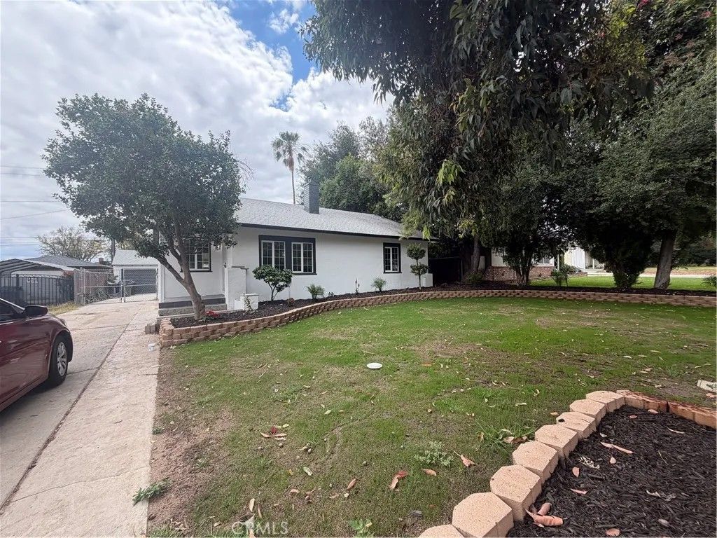 Photo of 1275 W Marshall Blvd, San Bernardino, CA 92405 (MLS # IV26093573)