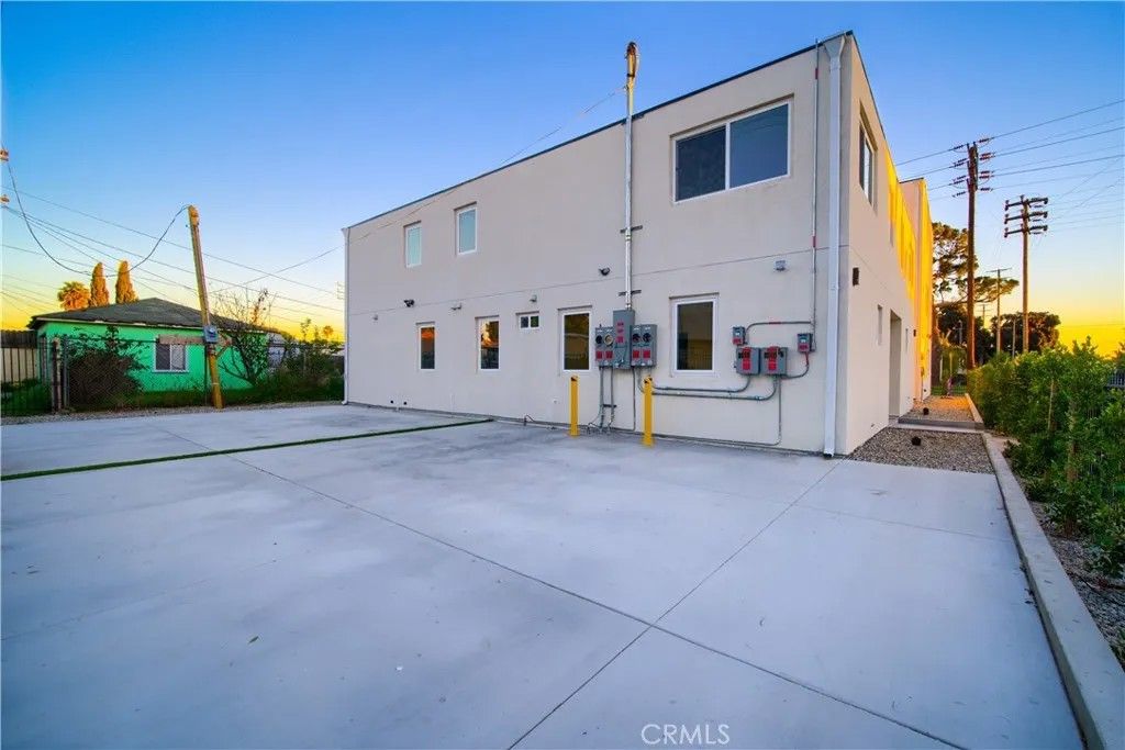 Photo of 8414 S McKinley Avenue, Los Angeles, CA 90001 (MLS # OC26007750)