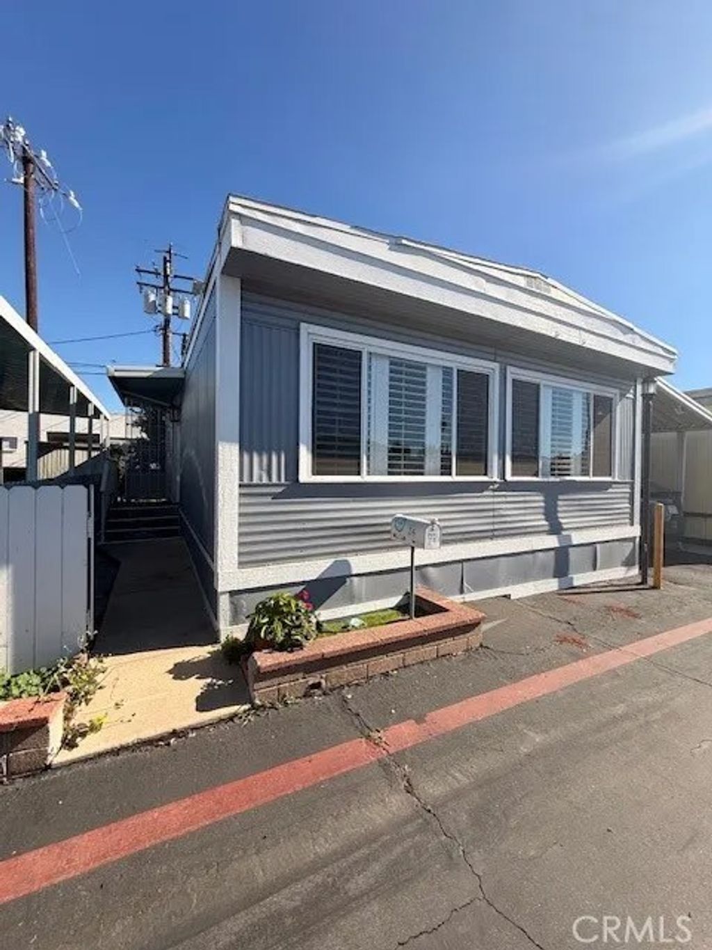 Photo of 716 N Grand Ave #J4, Covina, CA 91724 (MLS # DW25266989)